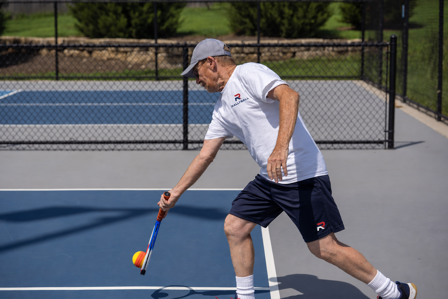 RALLYBALL player moving into an athletic forehand